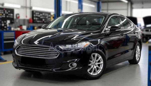 Ford Mondeo в автомастерской после ремонта